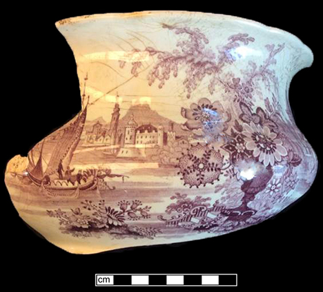 Purple printed underglaze white refined earthenware chamberpot in the Persian pattern by William Ridgways (1830-1854). Rim diameter:  7.0”; Base diameter: 5.75”; Vessel height:  5.0” -  from 18BC33.